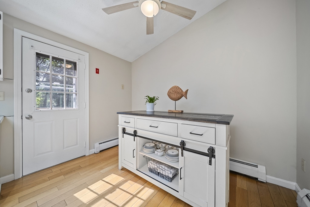 21 Woodman Road Amesbury, MA 01913 - Photo 6 of 30 a view of cabinets and window