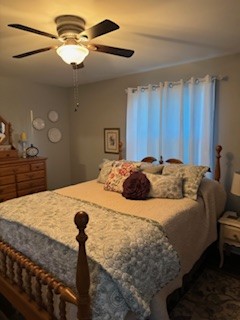 314 Kimbrough Road Clarksville, TN 37043 - Photo 17 of 29 a bedroom with a bed and a chandelier