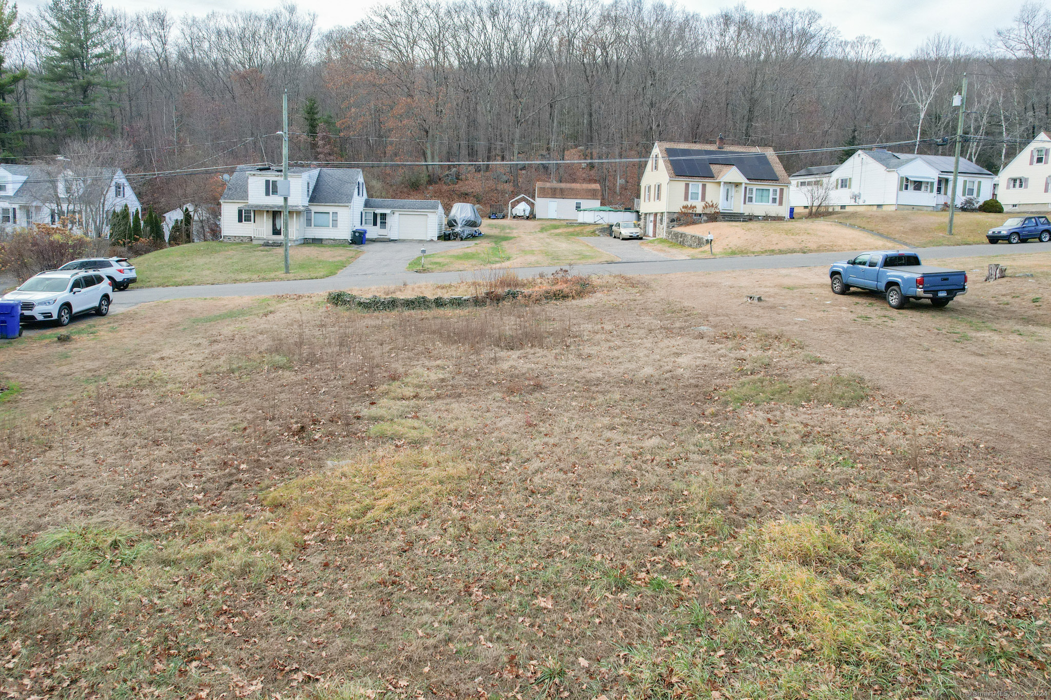 Red Mountain Avenue Torrington, CT 06790 - Photo 9 of 10 a front view of a house with basket ball court and fire pit