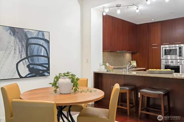 a dining room with furniture and window