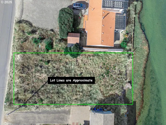 front view of a house with a sign broad