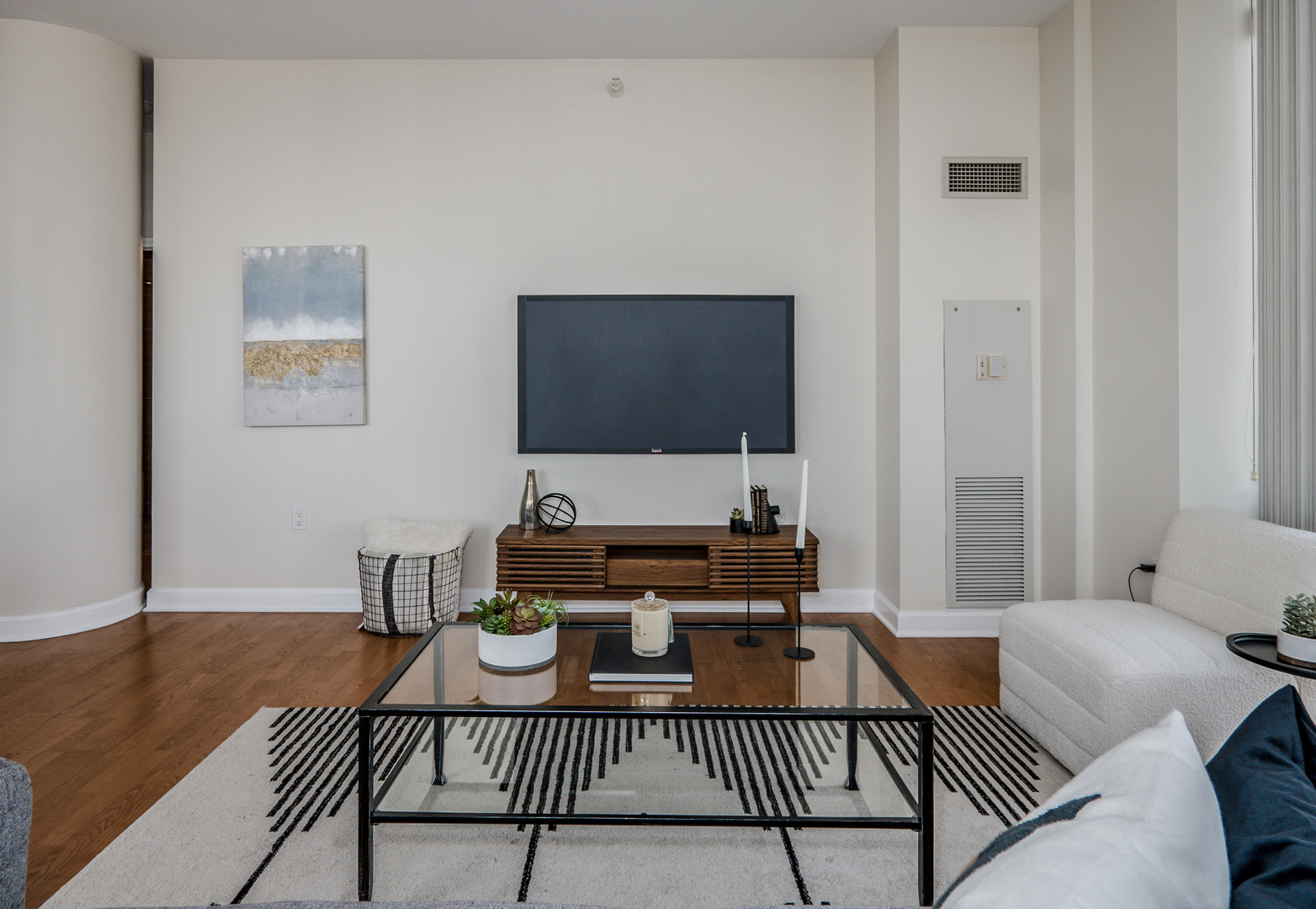 233 East 13th Street, Unit 2001 Chicago, IL 60605 - Photo 17 of 48 a view of a livingroom with furniture and wooden floor