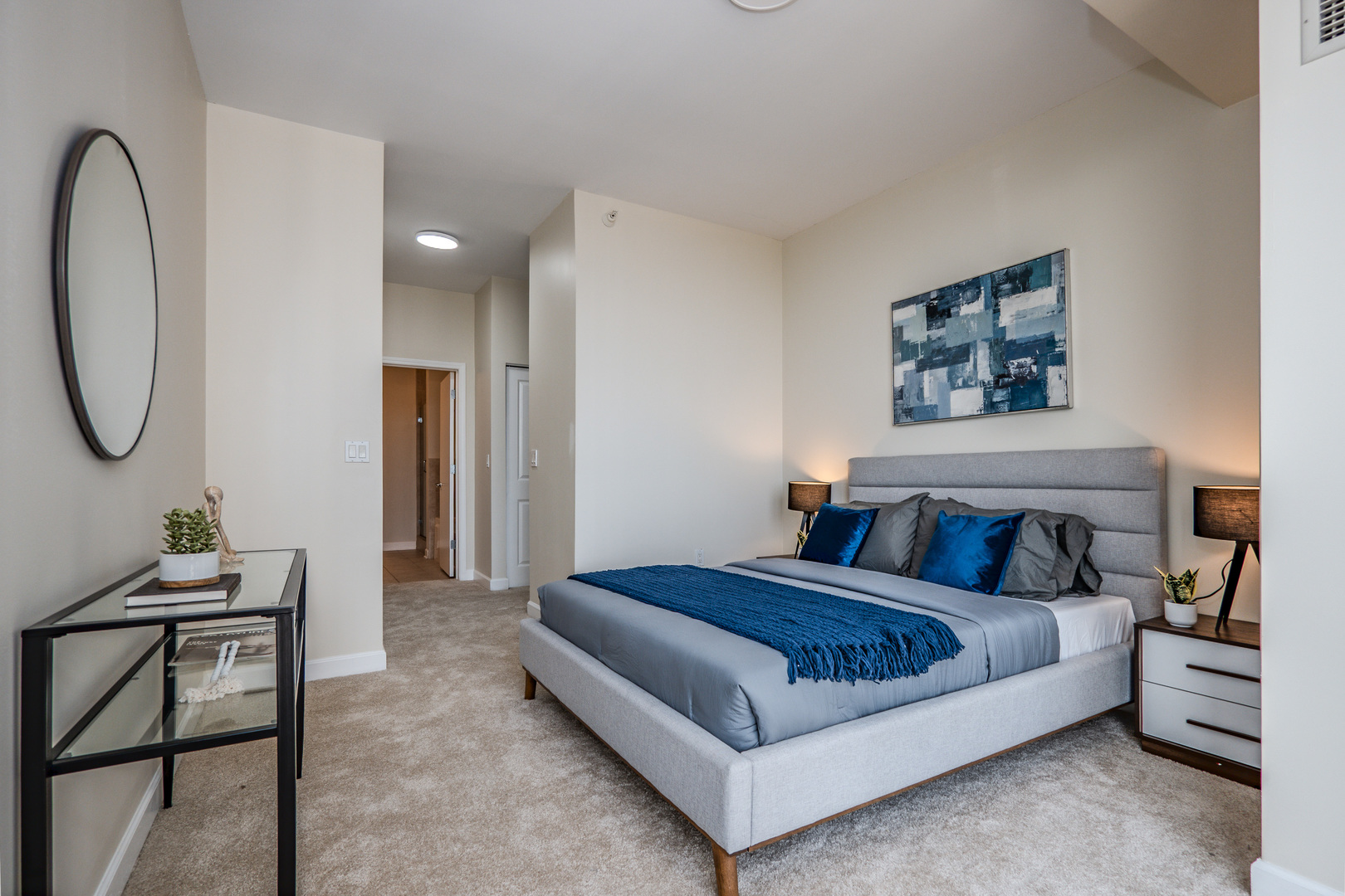233 East 13th Street, Unit 2001 Chicago, IL 60605 - Photo 21 of 48 a spacious bedroom with a bed a table and chair