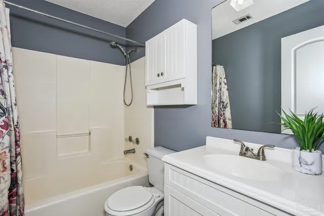 a view of backyard with green space