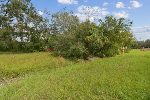 a view of a playground with basketball court