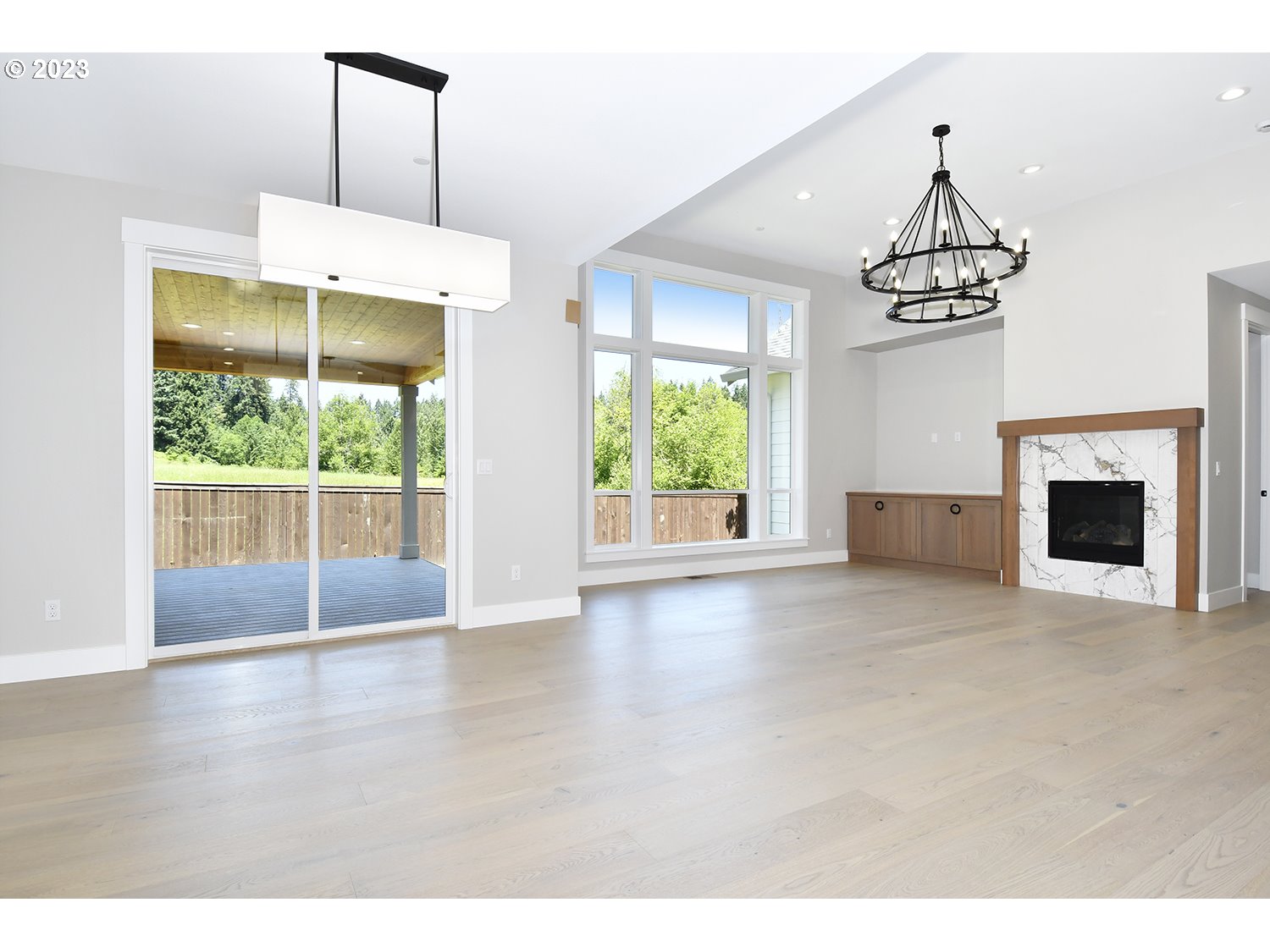 14915 Northeast 40th Street Vancouver, WA 98686 - Photo 3 of 17 a view of livingroom with furniture wooden floor and window