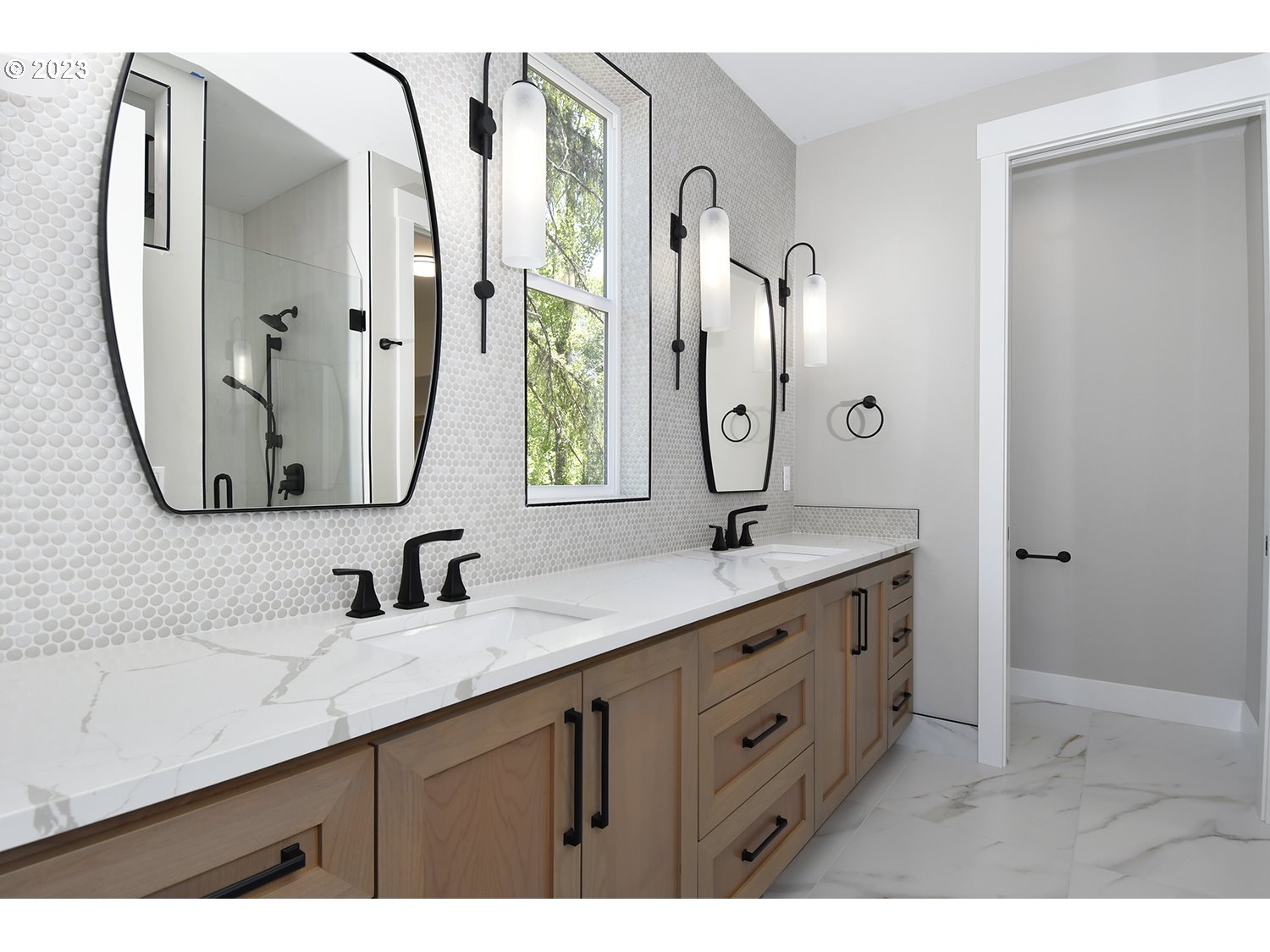 14915 Northeast 40th Street Vancouver, WA 98686 - Photo 10 of 17 a bathroom with a double vanity sink and a mirror