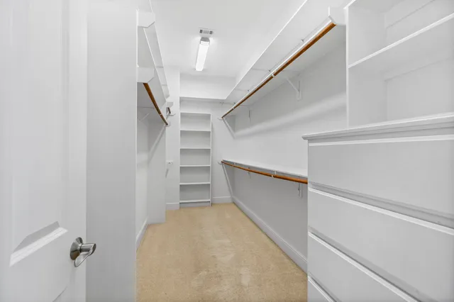 a view of entryway with stairs and wooden floor