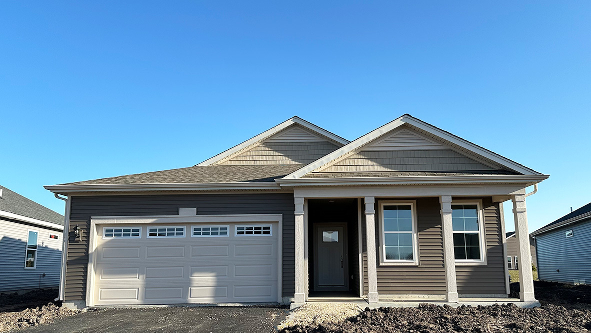 907 Plateau Drive Pingree Grove, IL 60140 - Photo 1 of 15 a front view of a house with yard