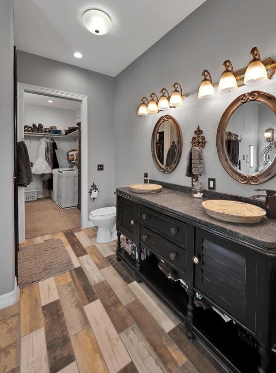 5004 Gholson Road Waco, TX 76705 - Photo 14 of 40 a bathroom with a sink and a mirror