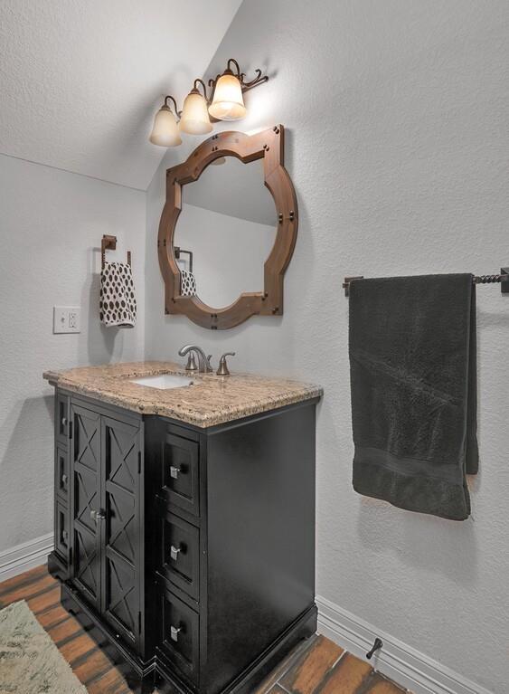 5004 Gholson Road Waco, TX 76705 - Photo 20 of 40 a bathroom with a sink and a mirror