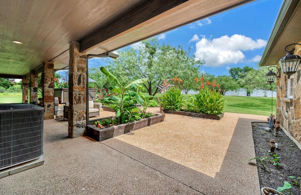 5004 Gholson Road Waco, TX 76705 - Photo 22 of 40 a view of a garden with patio