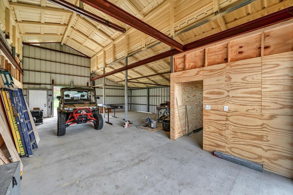 5004 Gholson Road Waco, TX 76705 - Photo 26 of 40 a view of a garage with parked cars