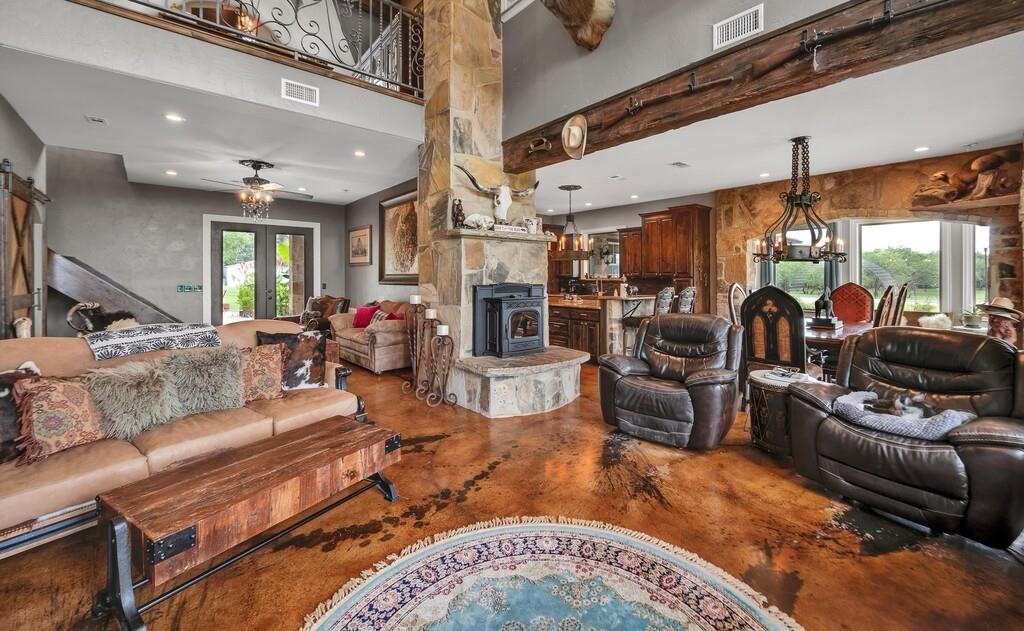 5004 Gholson Road Waco, TX 76705 - Photo 3 of 40 a living room with furniture and a flat screen tv