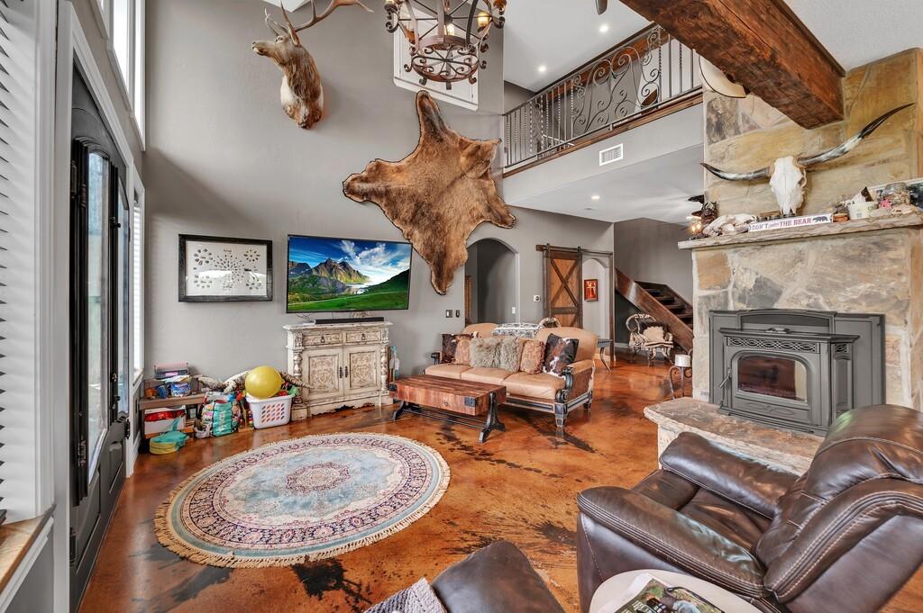 5004 Gholson Road Waco, TX 76705 - Photo 4 of 40 an outdoor living area with furniture and a fireplace