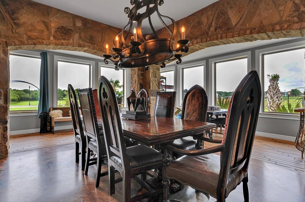 5004 Gholson Road Waco, TX 76705 - Photo 10 of 40 a view of a dining room with furniture and chandelier