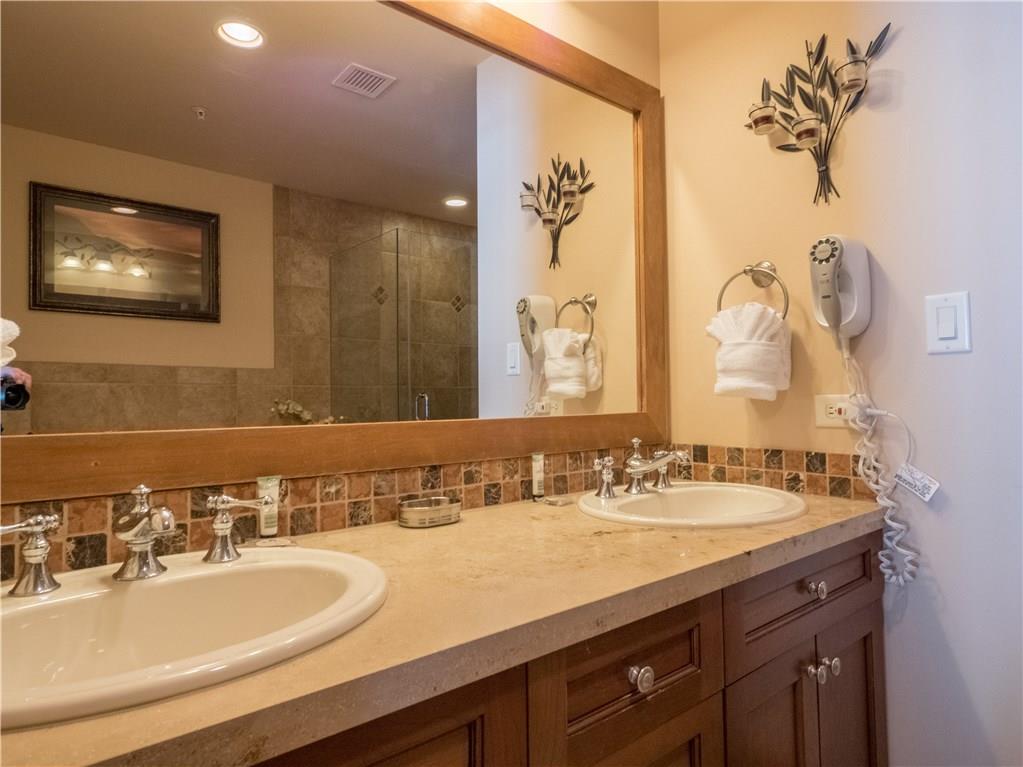 280 Trailhead Drive, Unit 3020 Keystone, CO 80435 - Photo 15 of 24 a bathroom with a sink and a mirror