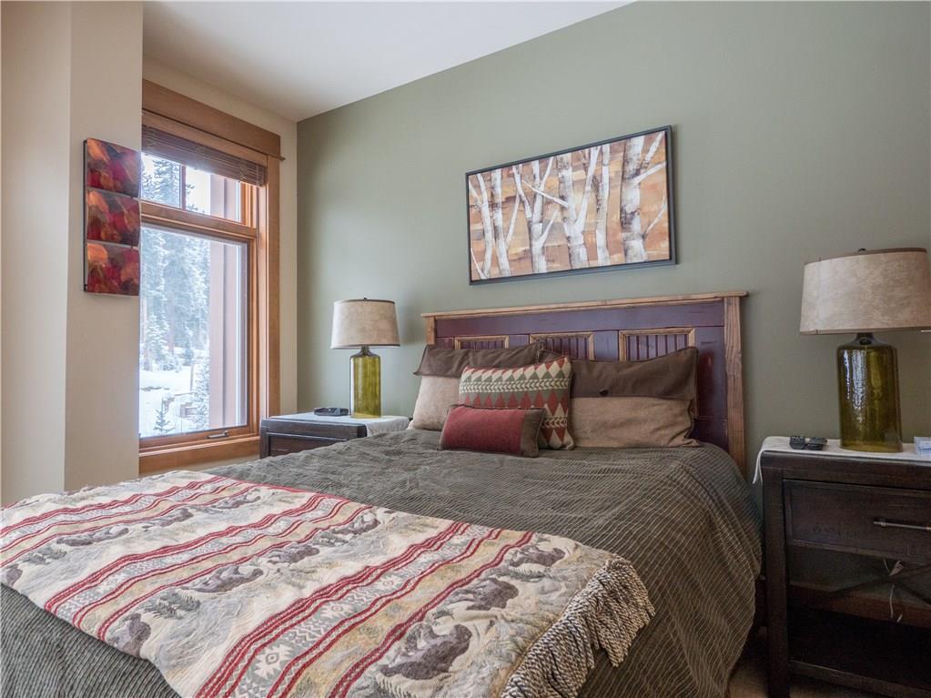 280 Trailhead Drive, Unit 3020 Keystone, CO 80435 - Photo 20 of 24 a bedroom with a large bed and a window
