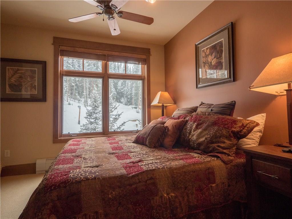 280 Trailhead Drive, Unit 3020 Keystone, CO 80435 - Photo 6 of 24 a bedroom with a large bed and a window