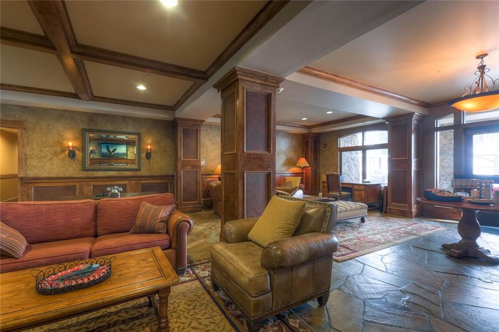 280 Trailhead Drive, Unit 3020 Keystone, CO 80435 - Photo 7 of 24 a living room with furniture a couch and wooden floor