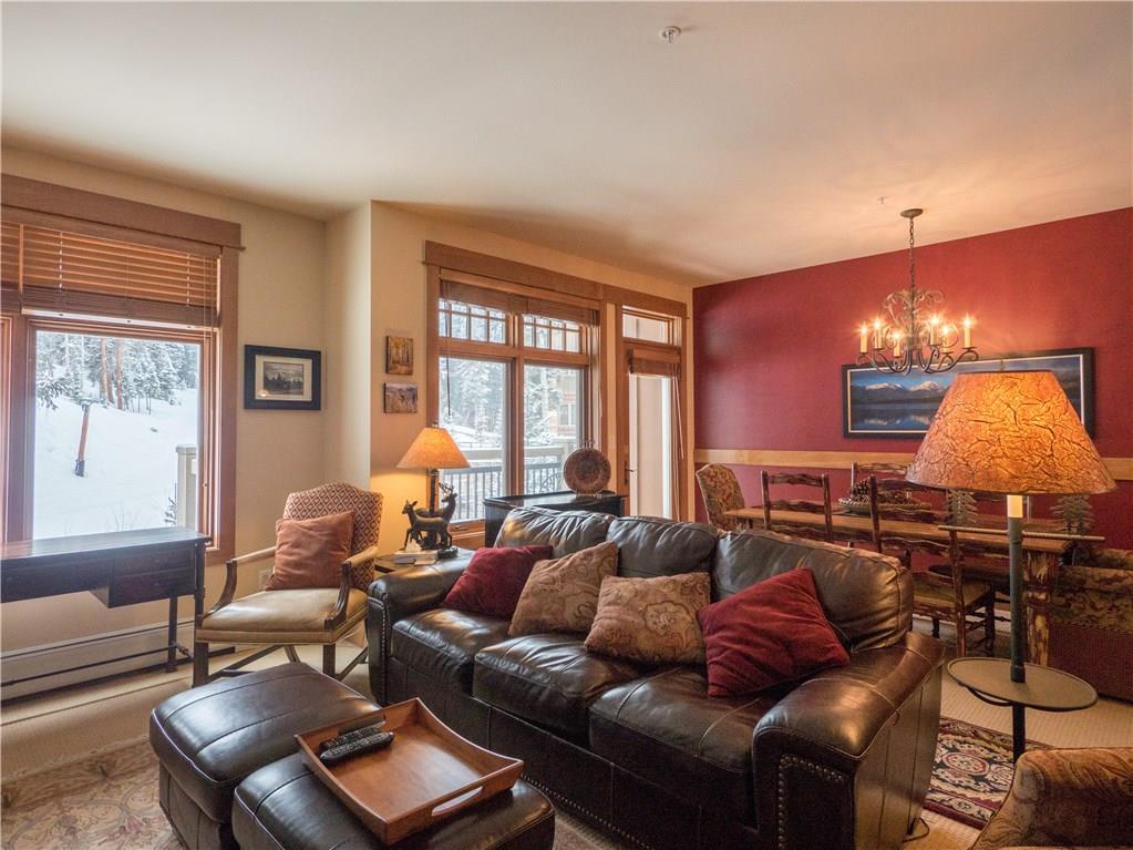 280 Trailhead Drive, Unit 3020 Keystone, CO 80435 - Photo 8 of 24 a living room with furniture and a lamp