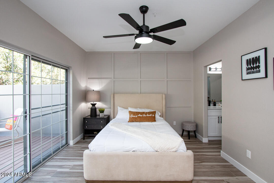 7710 East Gainey Ranch Road, Unit 137 Scottsdale, AZ 85258 - Photo 24 of 56 a bedroom with a bed and a ceiling fan