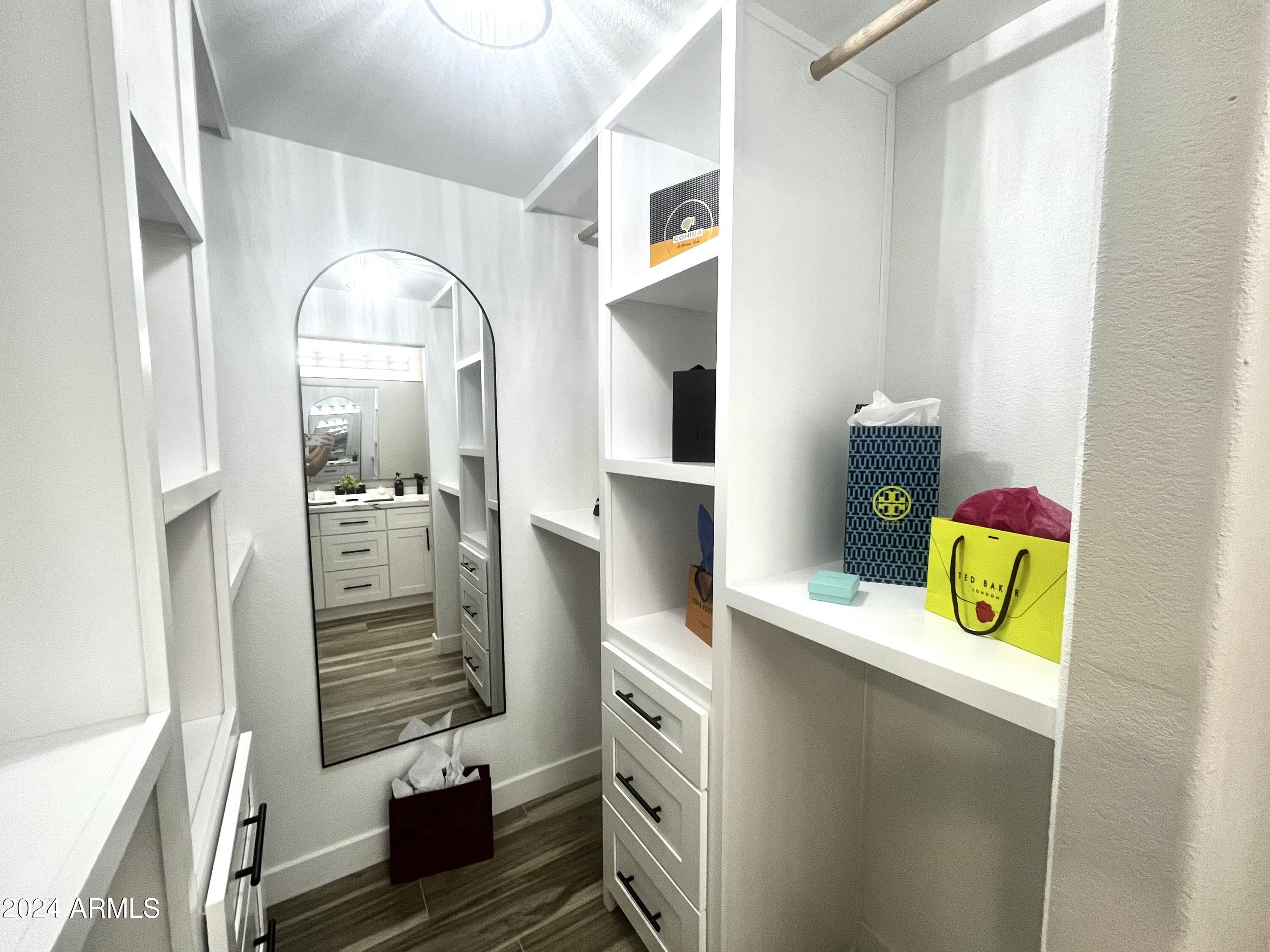 7710 East Gainey Ranch Road, Unit 137 Scottsdale, AZ 85258 - Photo 27 of 56 Master Closet