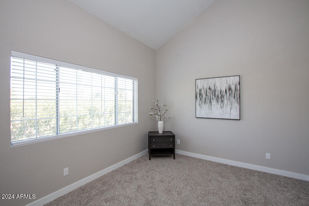 7710 East Gainey Ranch Road, Unit 137 Scottsdale, AZ 85258 - Photo 33 of 56 a big room with a window and closet