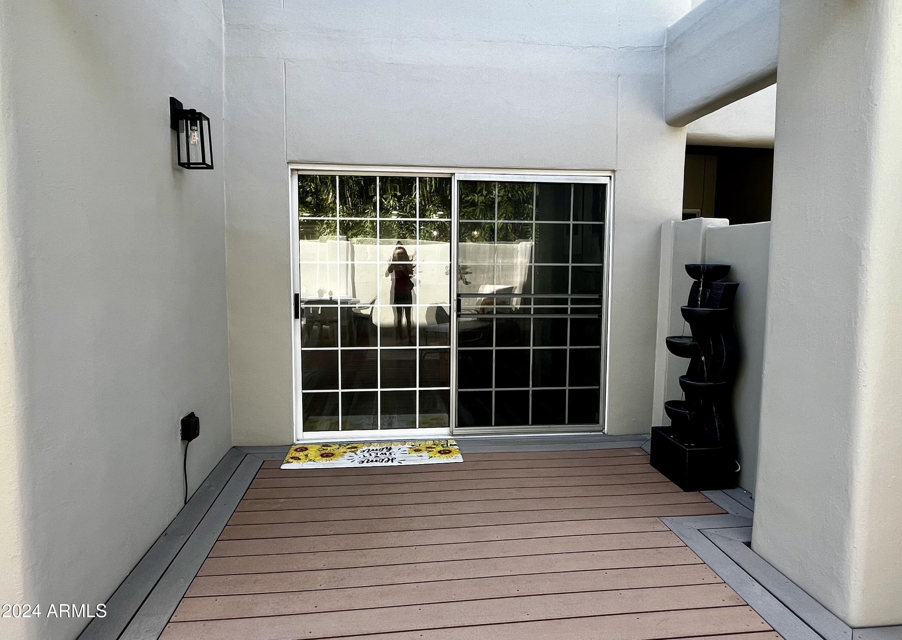 7710 East Gainey Ranch Road, Unit 137 Scottsdale, AZ 85258 - Photo 41 of 56 a view of front door deck and house