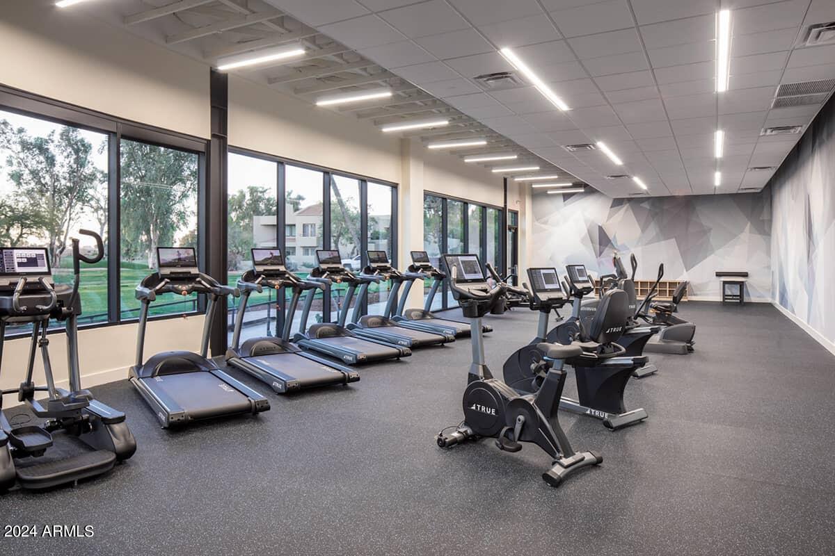 7710 East Gainey Ranch Road, Unit 137 Scottsdale, AZ 85258 - Photo 54 of 56 a view of a room with gym equipment