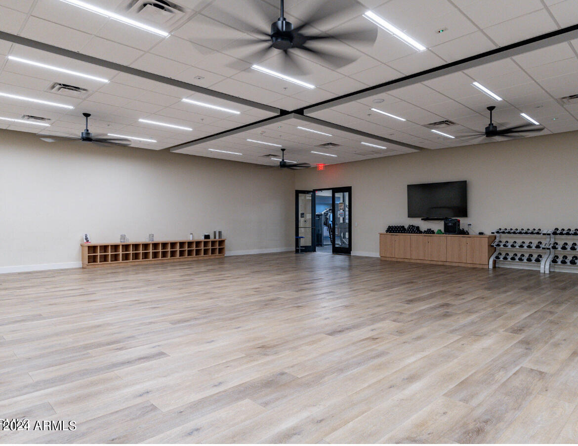 7710 East Gainey Ranch Road, Unit 137 Scottsdale, AZ 85258 - Photo 55 of 56 a view of a room with gym equipment