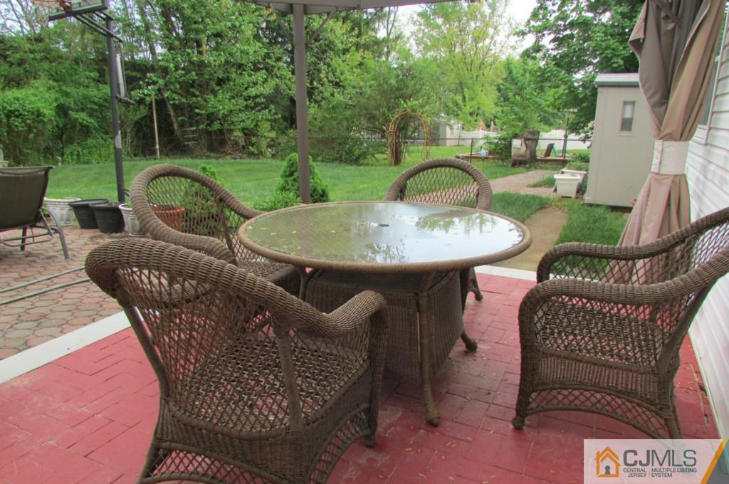 17 Gage Road East Brunswick, NJ 08816 - Photo 15 of 24 a view of a patio in the backyard