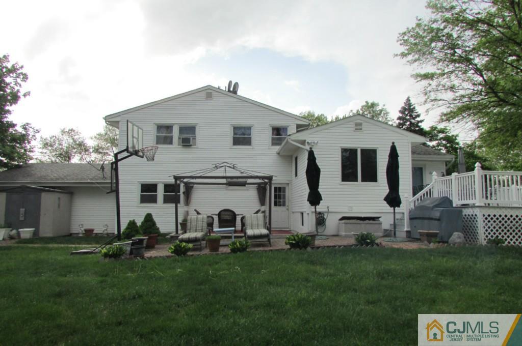 17 Gage Road East Brunswick, NJ 08816 - Photo 17 of 24 a view of a house with backyard