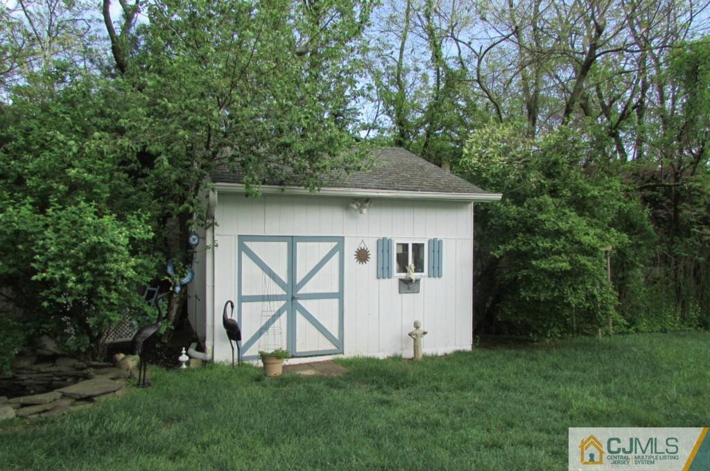 17 Gage Road East Brunswick, NJ 08816 - Photo 18 of 24 a front view of a house with garden