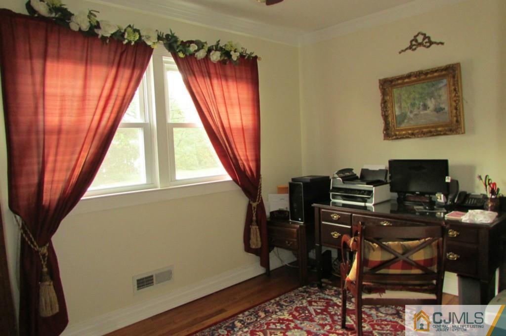 17 Gage Road East Brunswick, NJ 08816 - Photo 21 of 24 a view of a workspace with furniture and a window