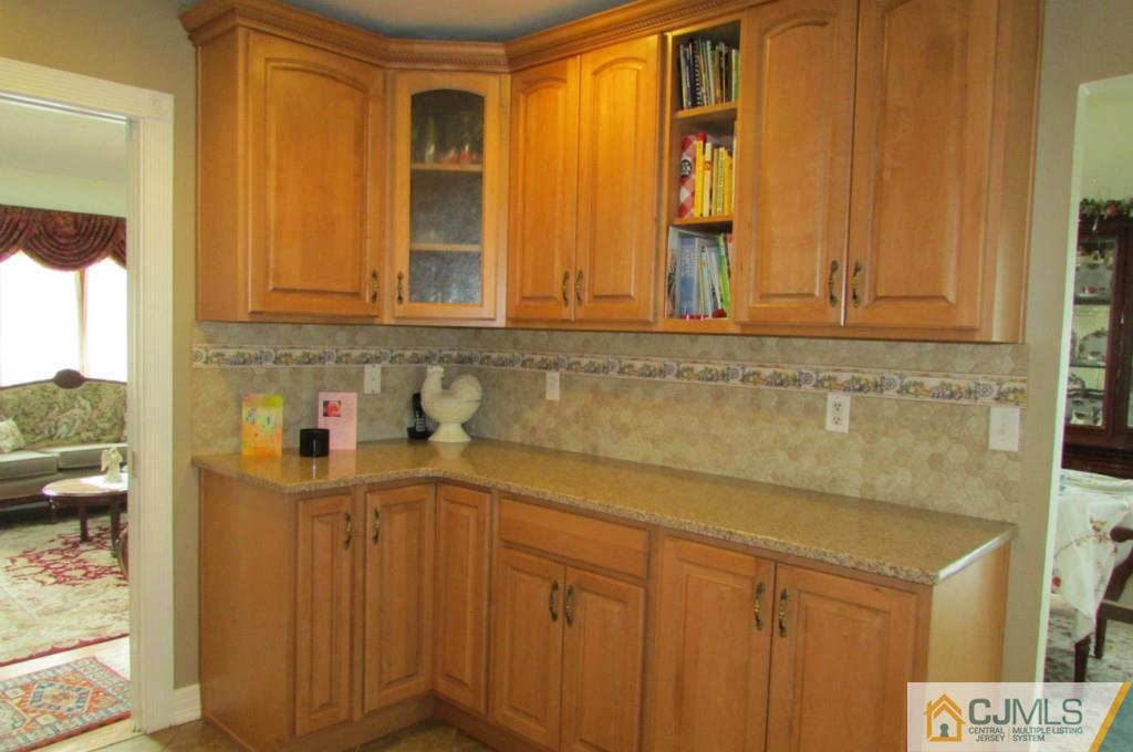 17 Gage Road East Brunswick, NJ 08816 - Photo 4 of 24 a bathroom with a sink and a mirror