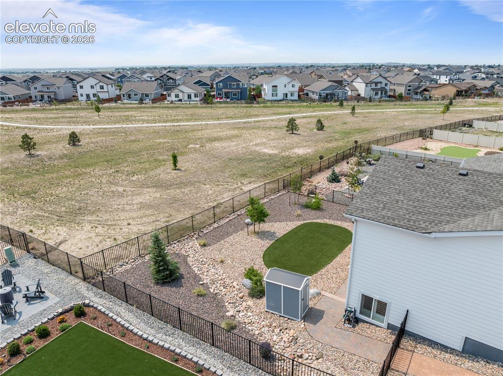 12781 Granite Ridge Drive Peyton, CO 80831 - Photo 3 of 41 Backing to open space, this meticulously landscaped lot is the PERFECT place to call home.