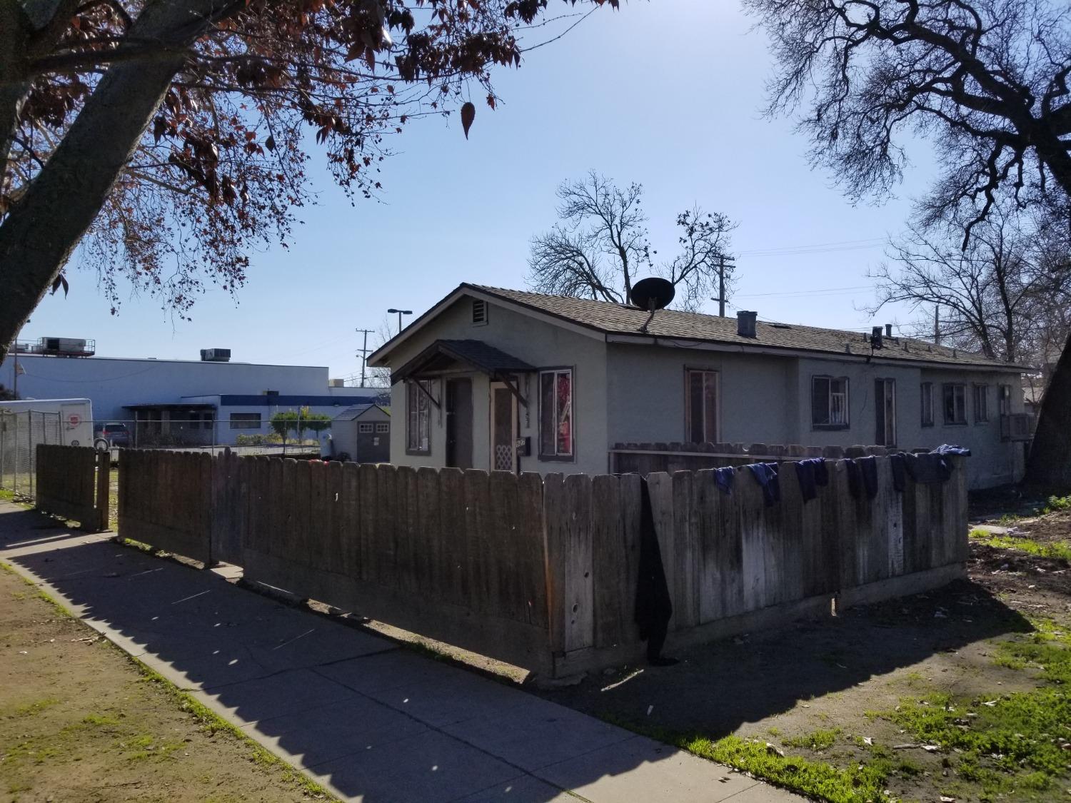 618 J Street Modesto, CA 95354 - Photo 15 of 38 a view of a house with a yard