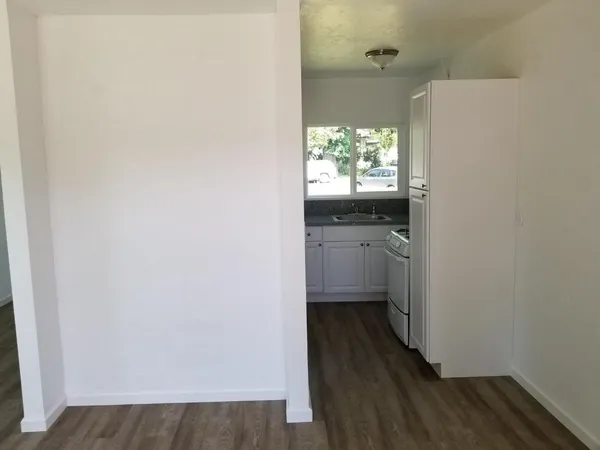 a bathroom with a sink and a window