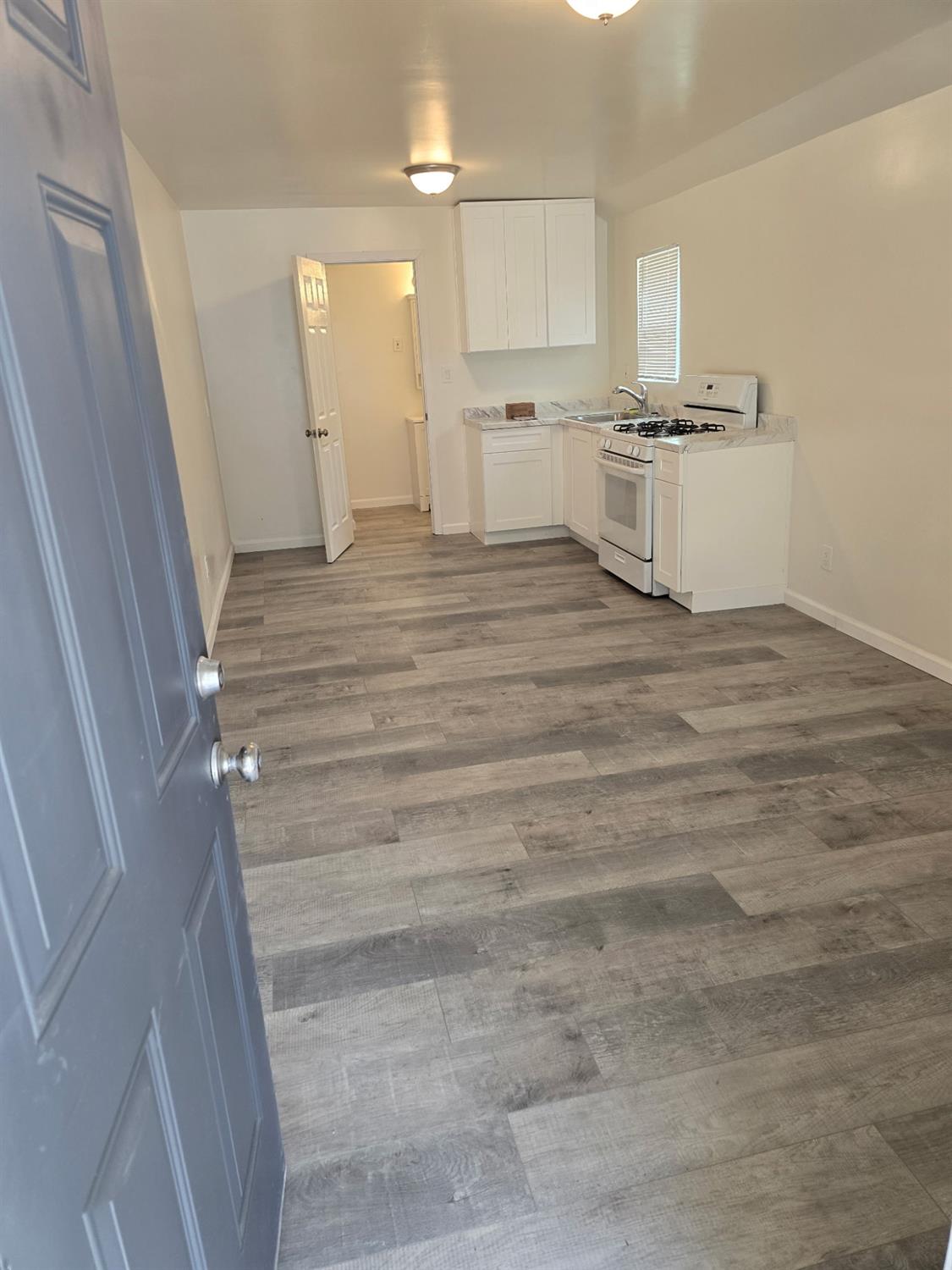 618 J Street Modesto, CA 95354 - Photo 30 of 38 a view of a kitchen with a sink