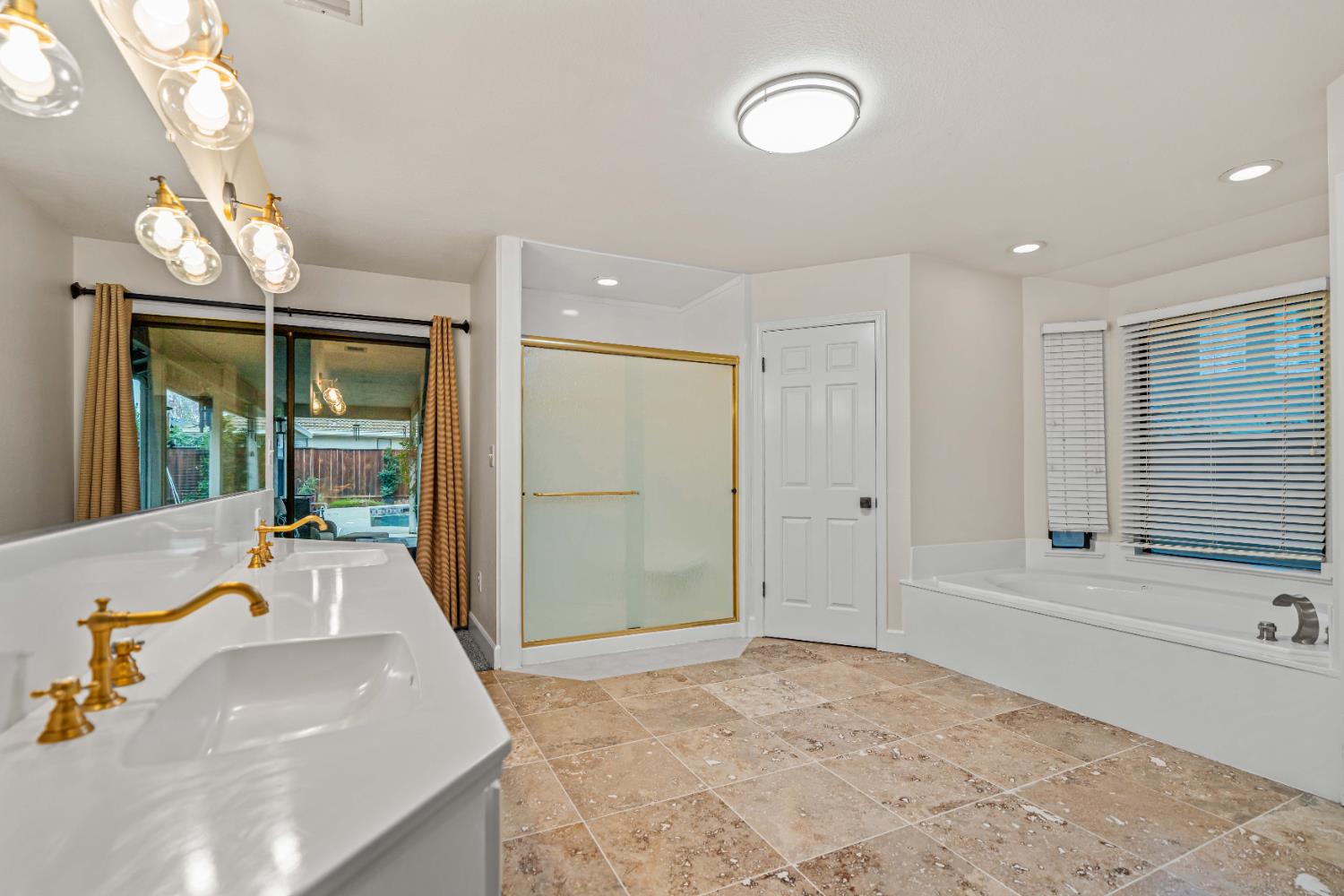 3829 Mondrian Drive Modesto, CA 95356 - Photo 18 of 37 a bathroom with a sink and a bathtub