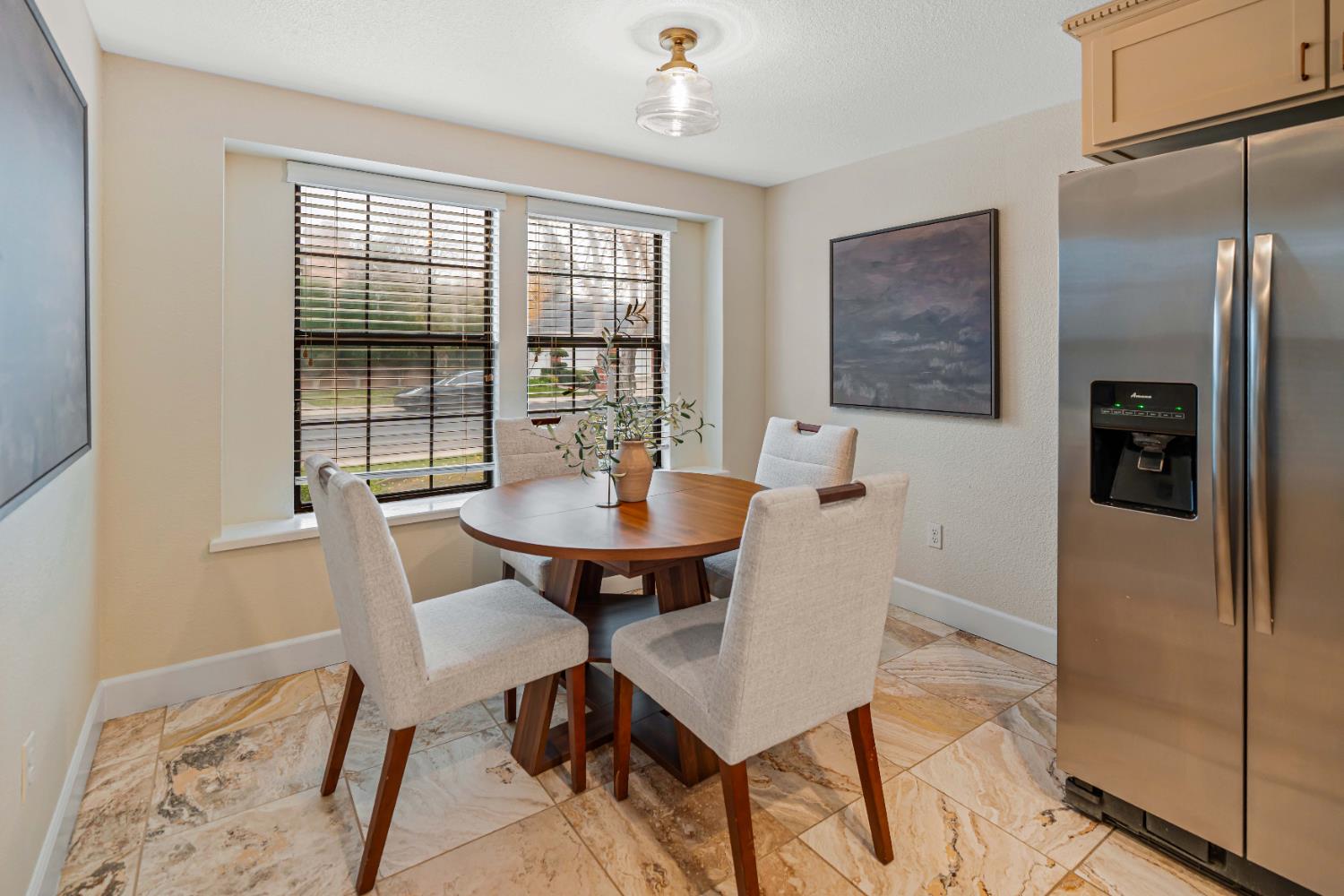 3829 Mondrian Drive Modesto, CA 95356 - Photo 9 of 37 a view of a dining room with furniture and window