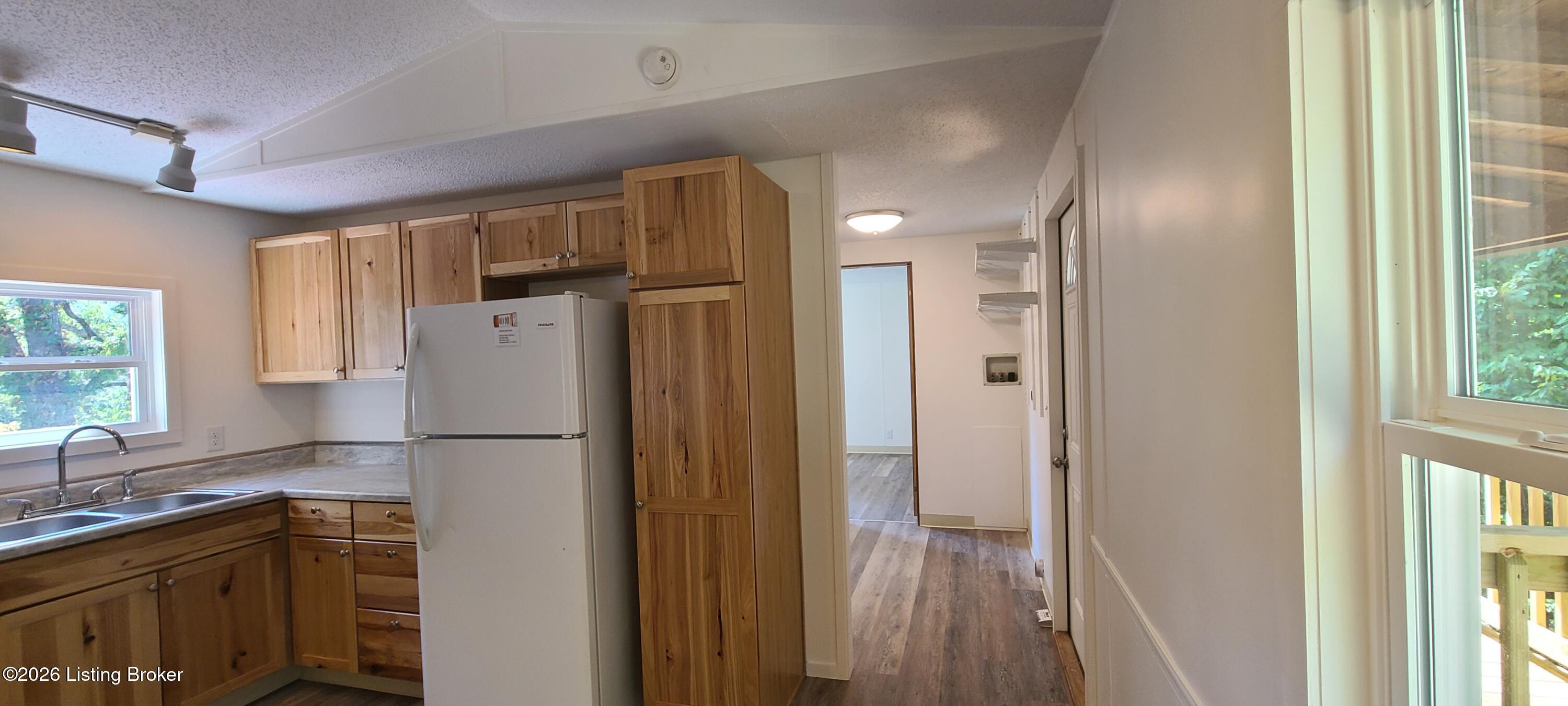 1580 Wilson Creek Road Boston, KY 40107 - Photo 23 of 54 kitchen to laundry