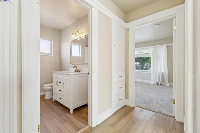 an empty room with closet area