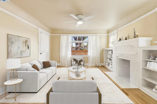 a living room with furniture and a fireplace