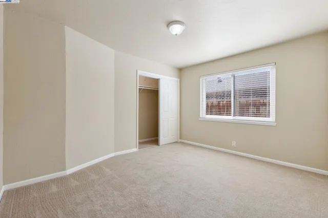 an empty room with window