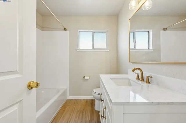 a bathroom with a sink and a toilet