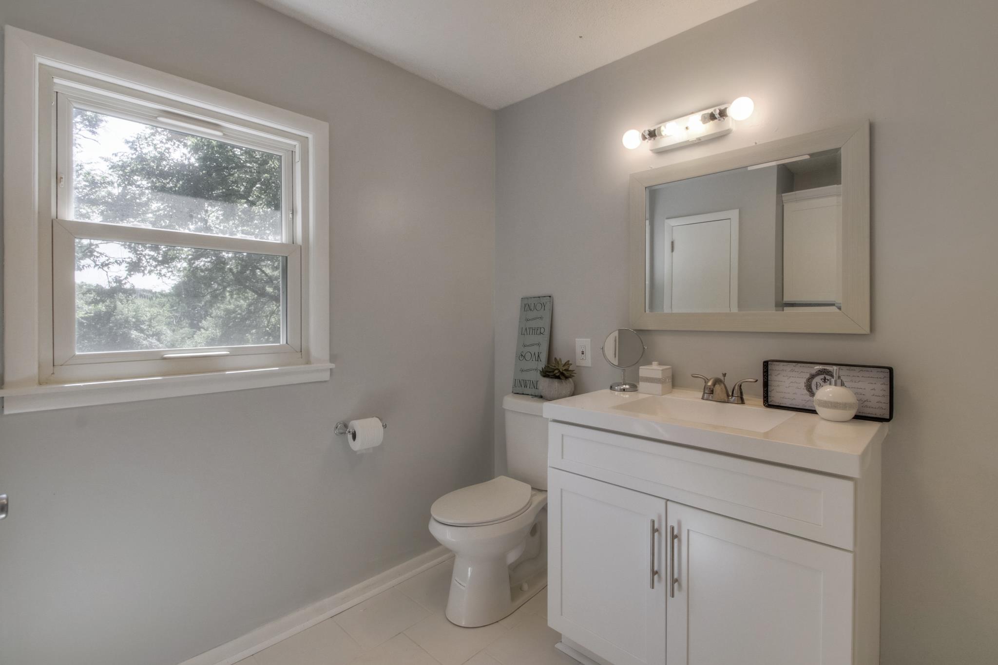 4855 Payne Road Antioch, TN 37013 - Photo 14 of 21 Upstairs bathroom with new vanity and toliet
