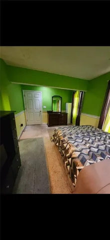 a view of a yard and front view of a house