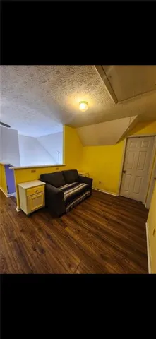 a view of a balcony with chairs